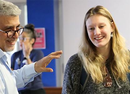 Hartwick College student with staff member